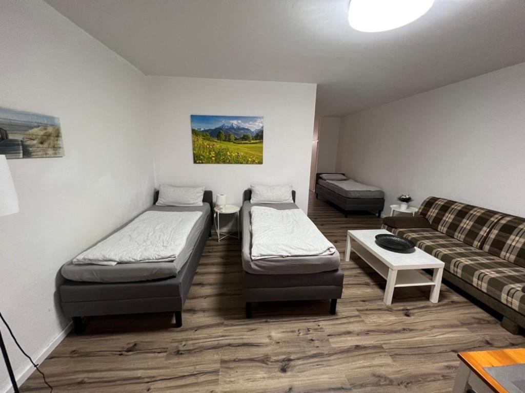 Ένα ή περισσότερα κρεβάτια σε δωμάτιο στο Wohnung in Troisdorf