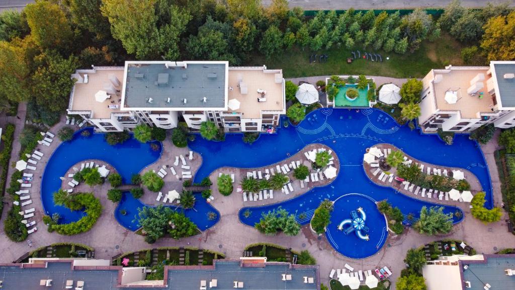 an aerial view of a resort with a swimming pool at Cascadas Family Resort 2-Rooms Apartment sunny beach in Sunny Beach