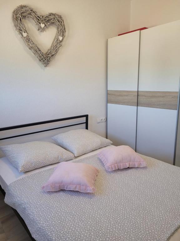 Posteľ alebo postele v izbe v ubytovaní Appartement Baraba