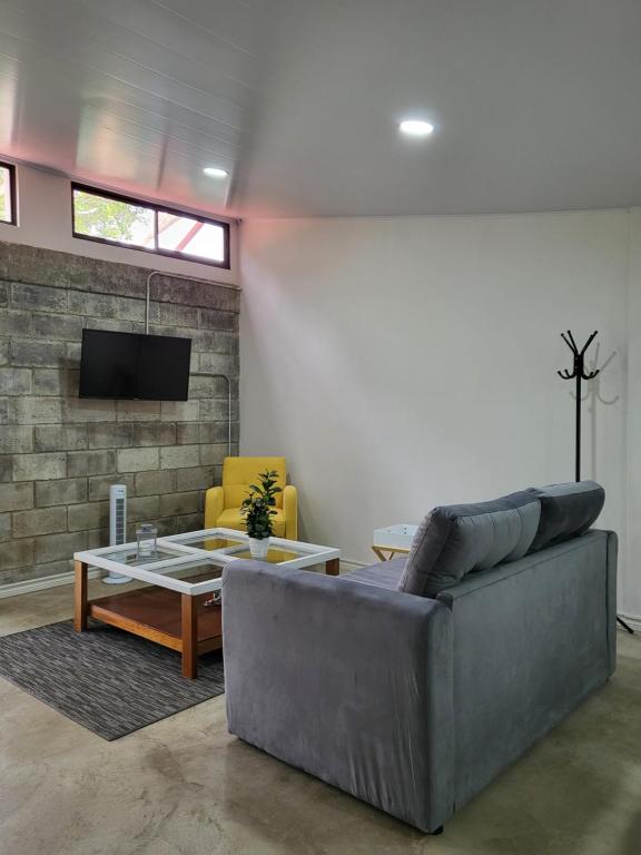 TV a/nebo společenská místnost v ubytování Casa del Café - Loft