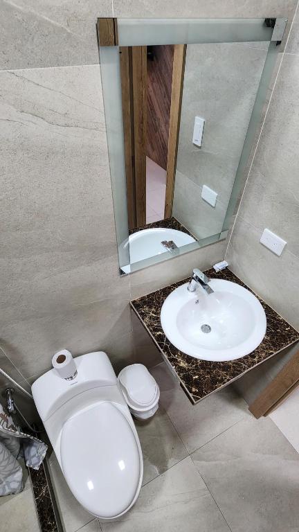 Koupelna v ubytování Hotel Murali - Cerca del Aeropuerto de Guayaquil