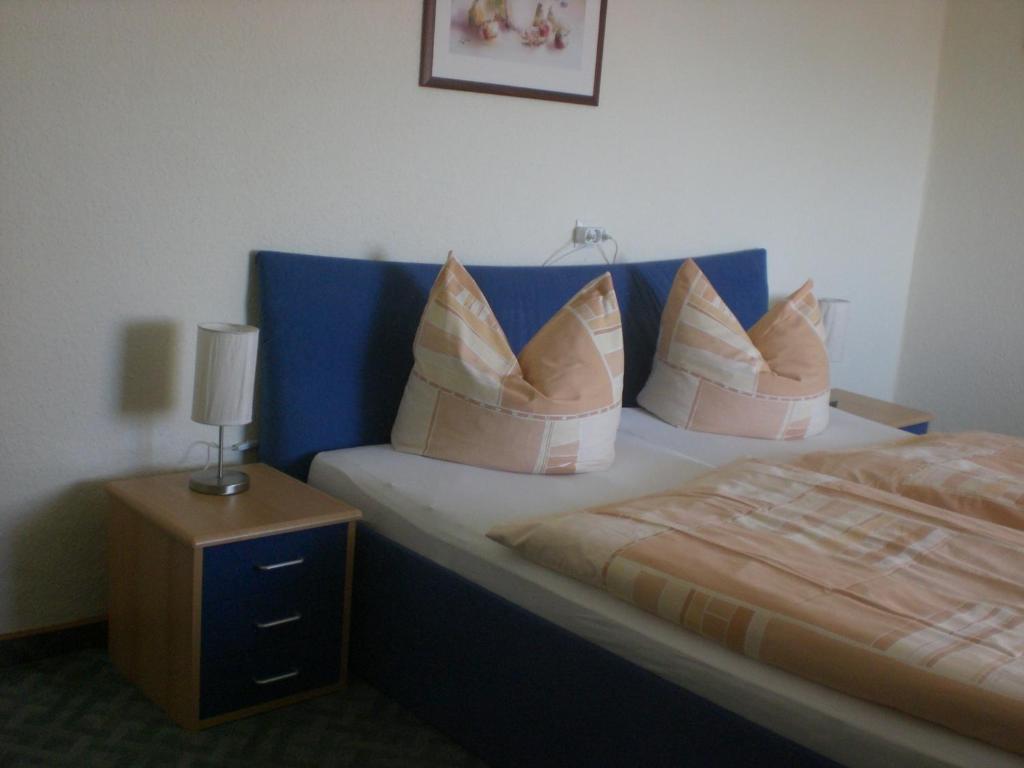 Postel nebo postele na pokoji v ubytování Pension Villa Sophia