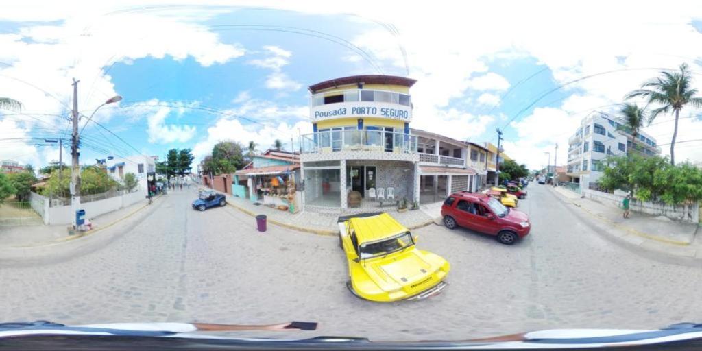 a rendering of a street with cars and a building at Pousada Porto Seguro in Porto De Galinhas