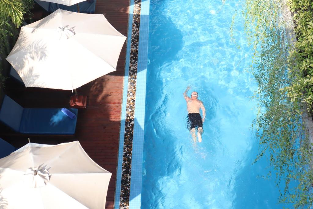 Bazén v ubytování Siem Reap Palace Hotel & Spa nebo v jeho okolí