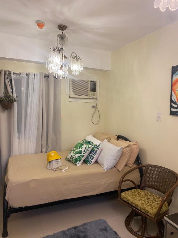 Posteľ alebo postele v izbe v ubytovaní CASITA LUCINA: Condo in Paranaque near Jaka Plaza and S&R