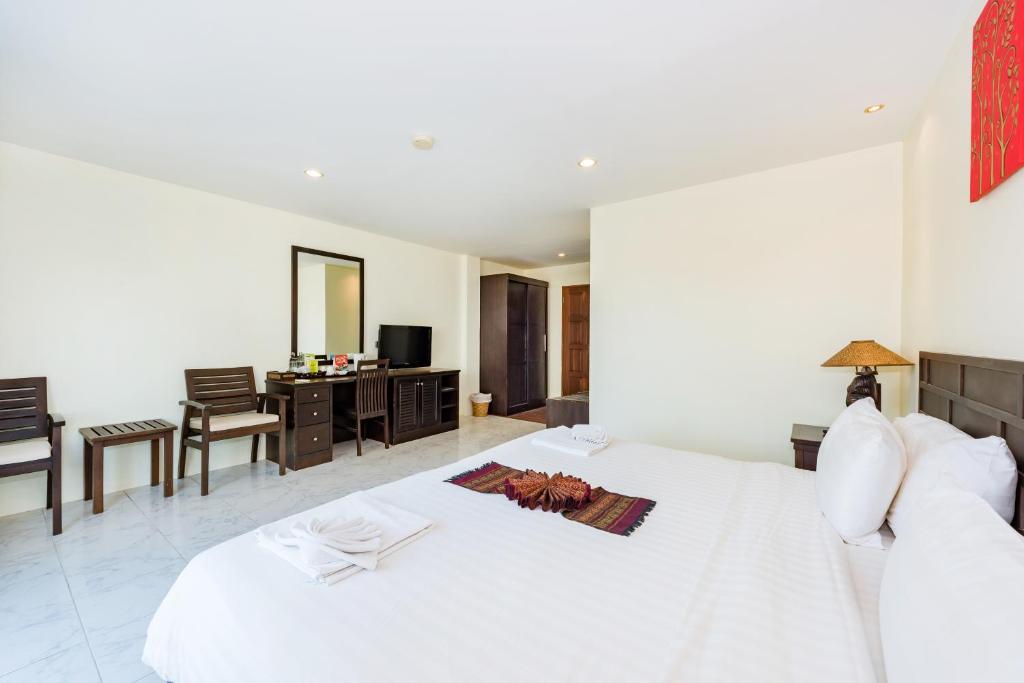 Postel nebo postele na pokoji v ubytování My Hotel Phuket