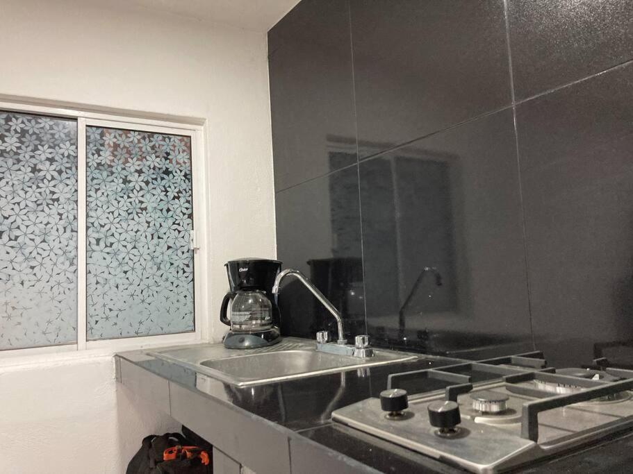 Kuchyň nebo kuchyňský kout v ubytování Depa wifi en corredor de balnearios