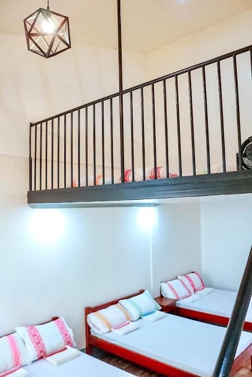 Postel nebo postele na pokoji v ubytování Airport View Hotel Vigan