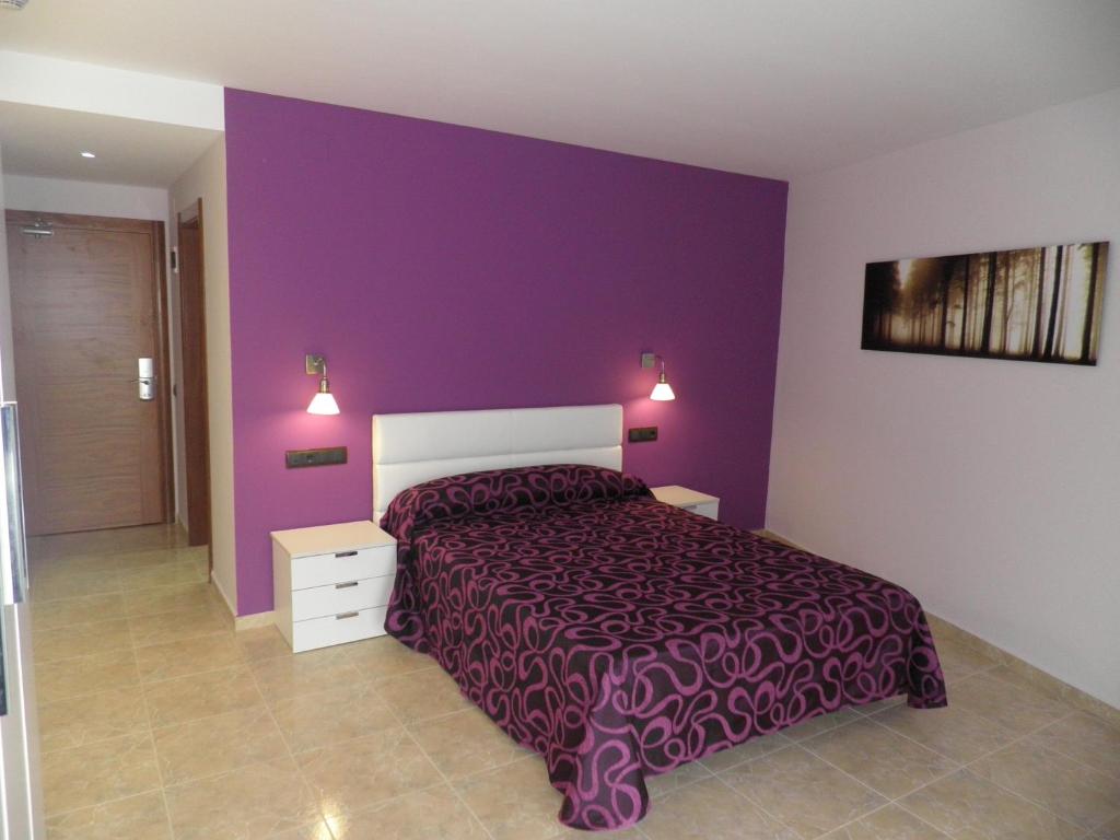 Postel nebo postele na pokoji v ubytování Hotel Meson de L’Ainsa