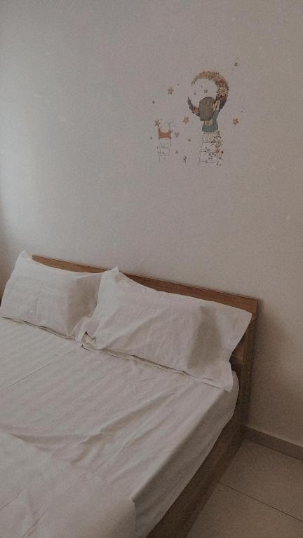 Letto o letti in una camera di Gopeng Serumah Holiday House