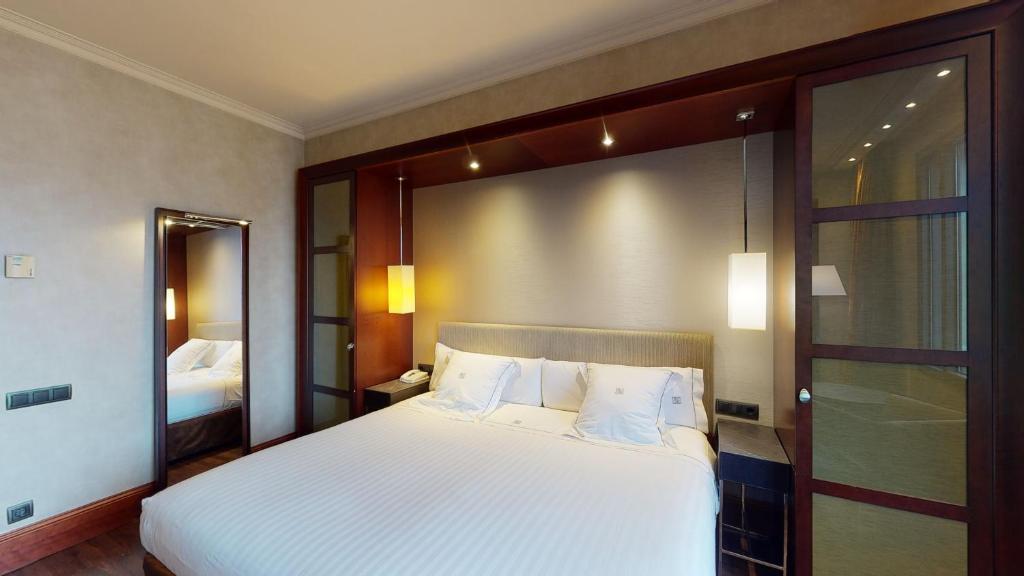 Posteľ alebo postele v izbe v ubytovaní Hotel Barcelona Center