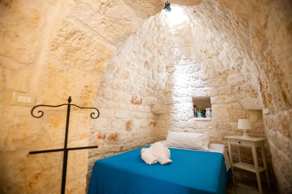 Postel nebo postele na pokoji v ubytování Pietre Bianche
