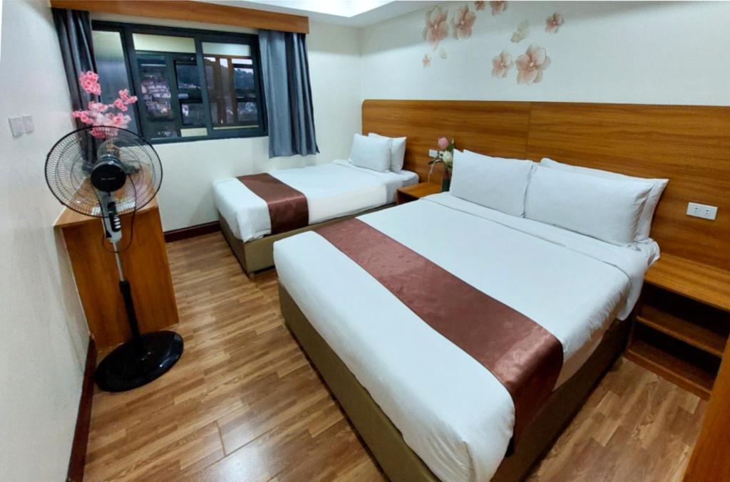 Postel nebo postele na pokoji v ubytování 456 Hotel