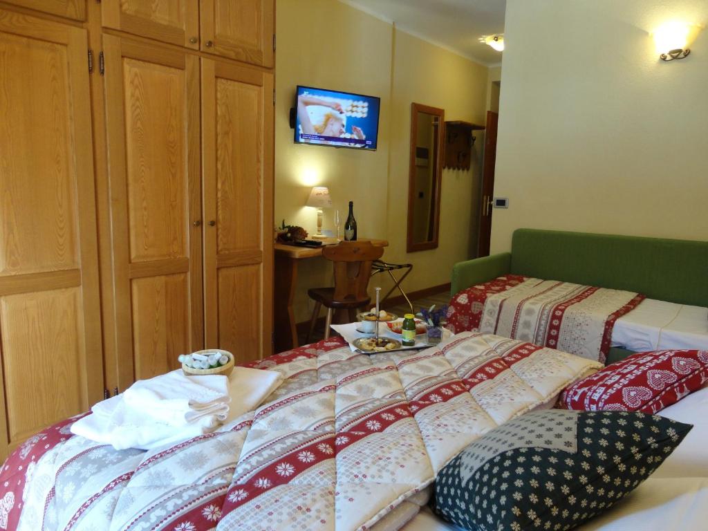 Postel nebo postele na pokoji v ubytování Grand Hotel Principe