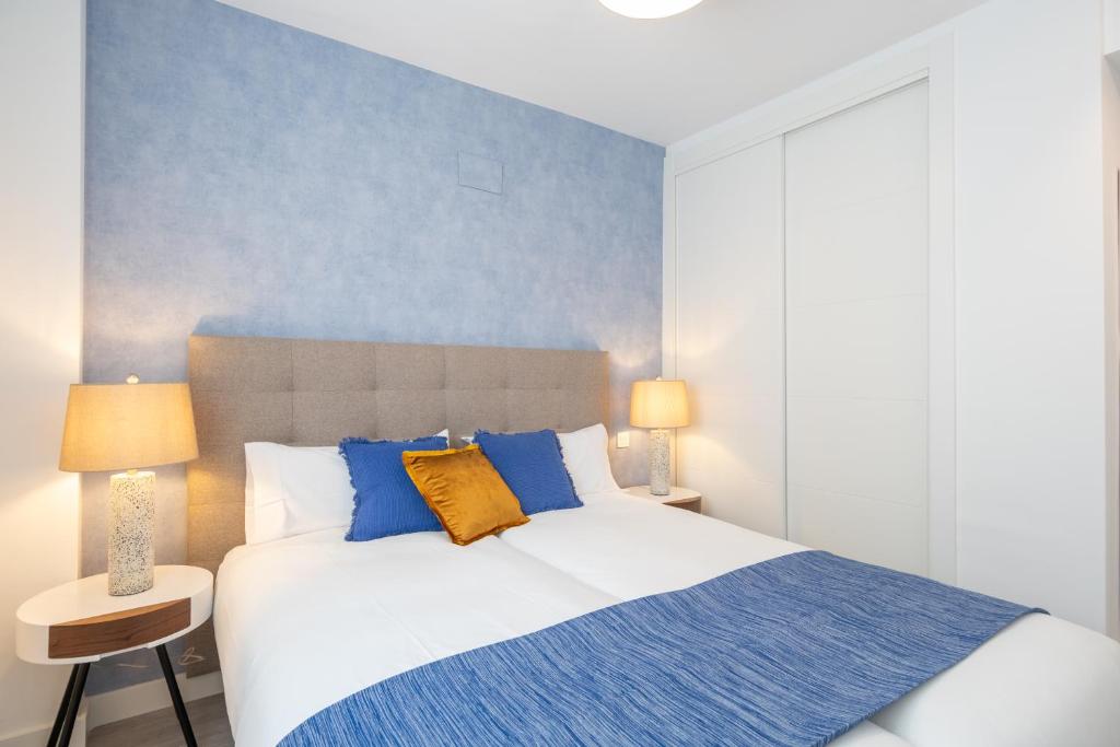 Postel nebo postele na pokoji v ubytování Princesas Flat, Luxury Apartament near beach&metro Free Parking