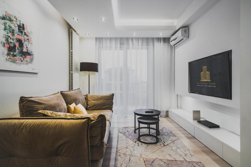 TV a/nebo společenská místnost v ubytování J&K Platinum Towers