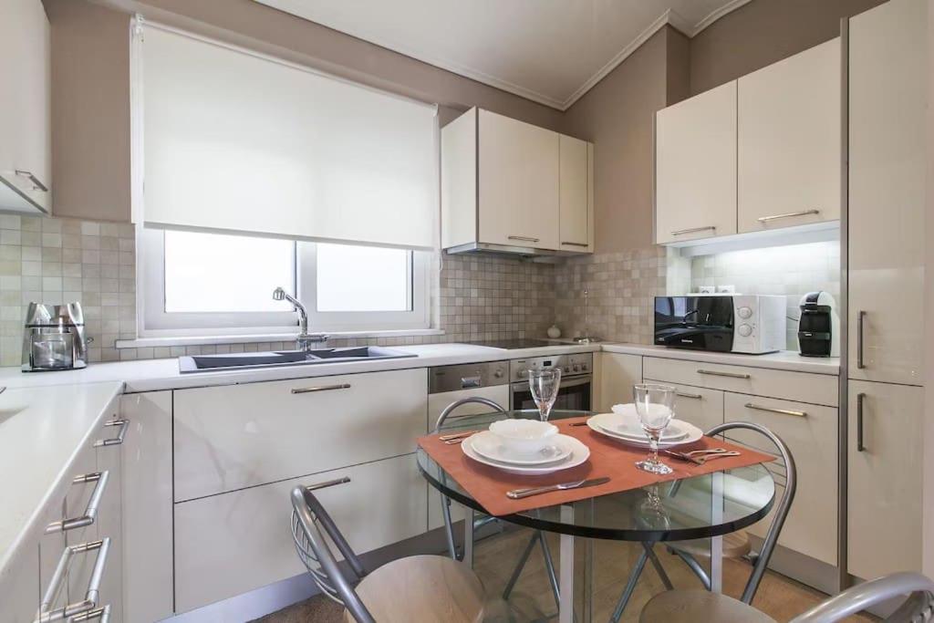 A kitchen or kitchenette at Luxury Acropolis View Duplex Penthouse in Thiseio 155m2