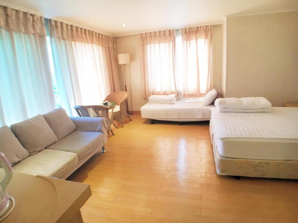 Postel nebo postele na pokoji v ubytování Hotel Good Inn