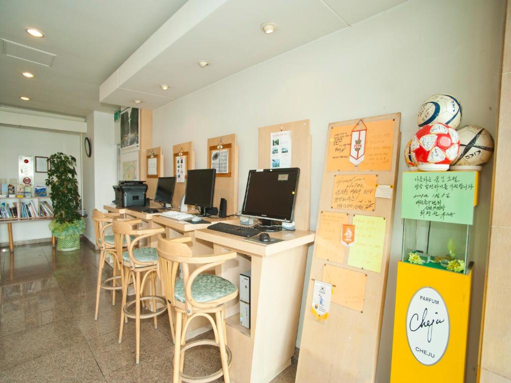 TV a/nebo společenská místnost v ubytování Hotel Good Inn