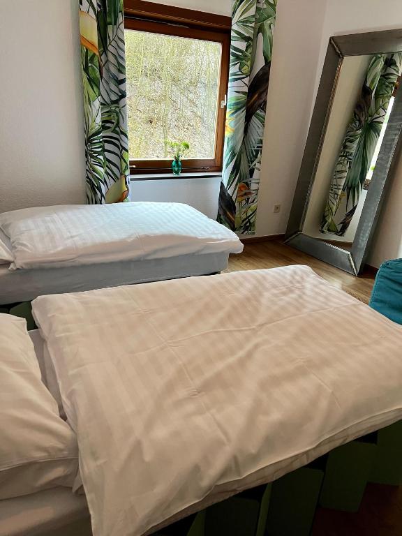 Postel nebo postele na pokoji v ubytování Waldseele Appartement