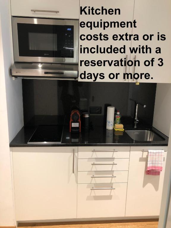 Kuchyň nebo kuchyňský kout v ubytování Residence Appartements