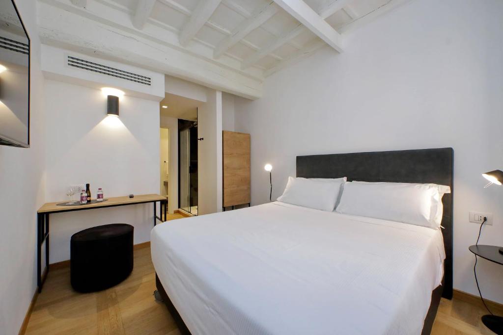 Llit o llits en una habitació de Youroom Vite
