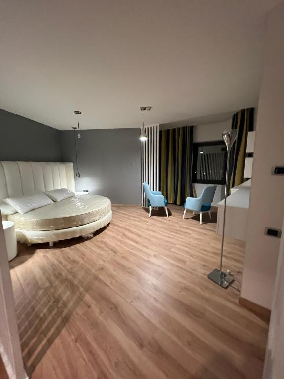 Postel nebo postele na pokoji v ubytování Park Hotel Mirabeau
