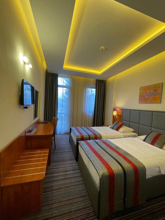 Postel nebo postele na pokoji v ubytování Spa Hotel Terme
