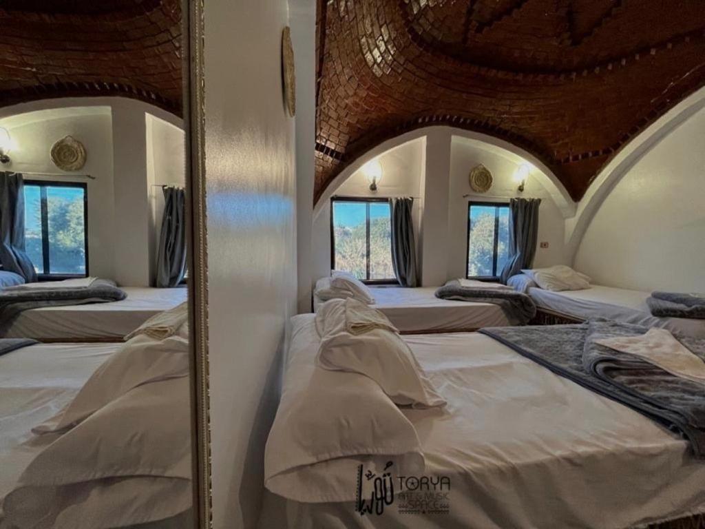Letto o letti in una camera di Torya Nubian House