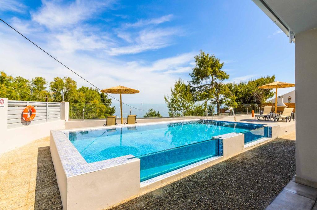 Bazén v ubytovaní Amare La Vita Villa by Solmar Villas alebo v jeho blízkosti