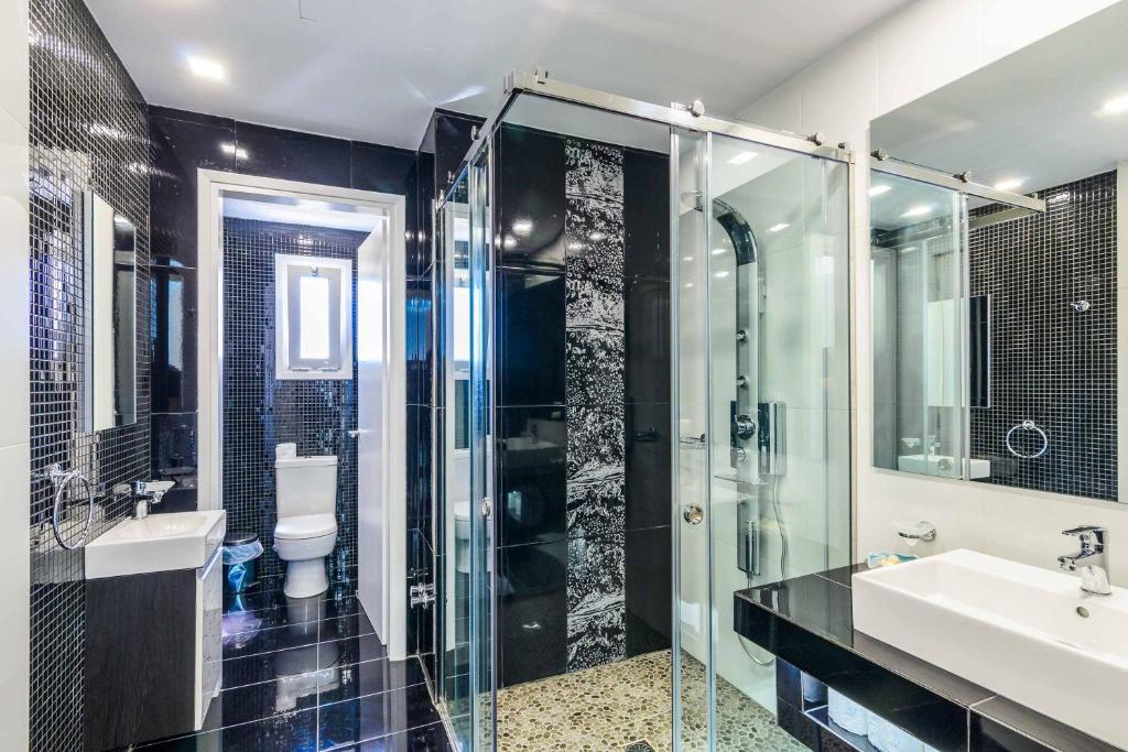 Kúpeľňa v ubytovaní Amare La Vita Villa by Solmar Villas