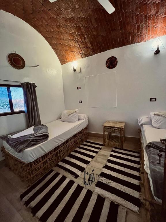 Letto o letti in una camera di Torya Nubian House