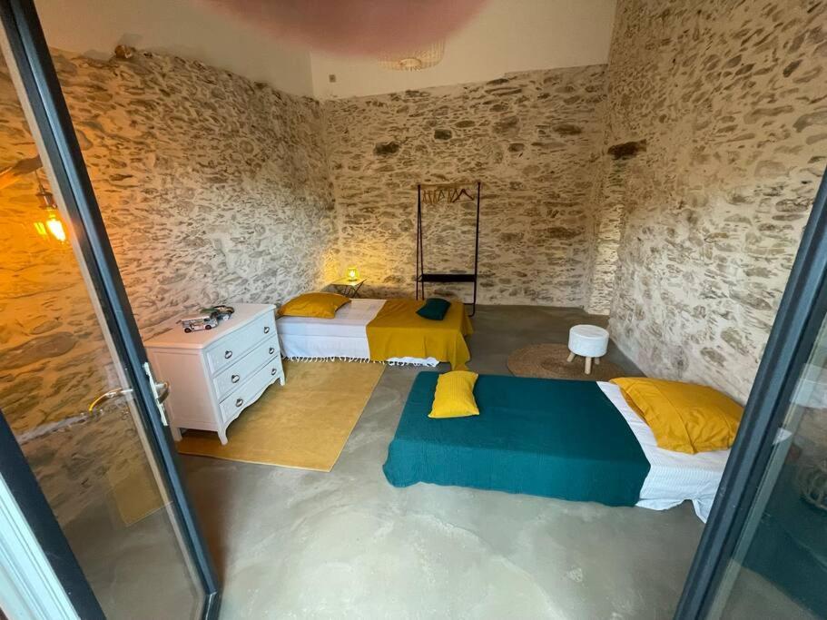 Postel nebo postele na pokoji v ubytování Charmant logement