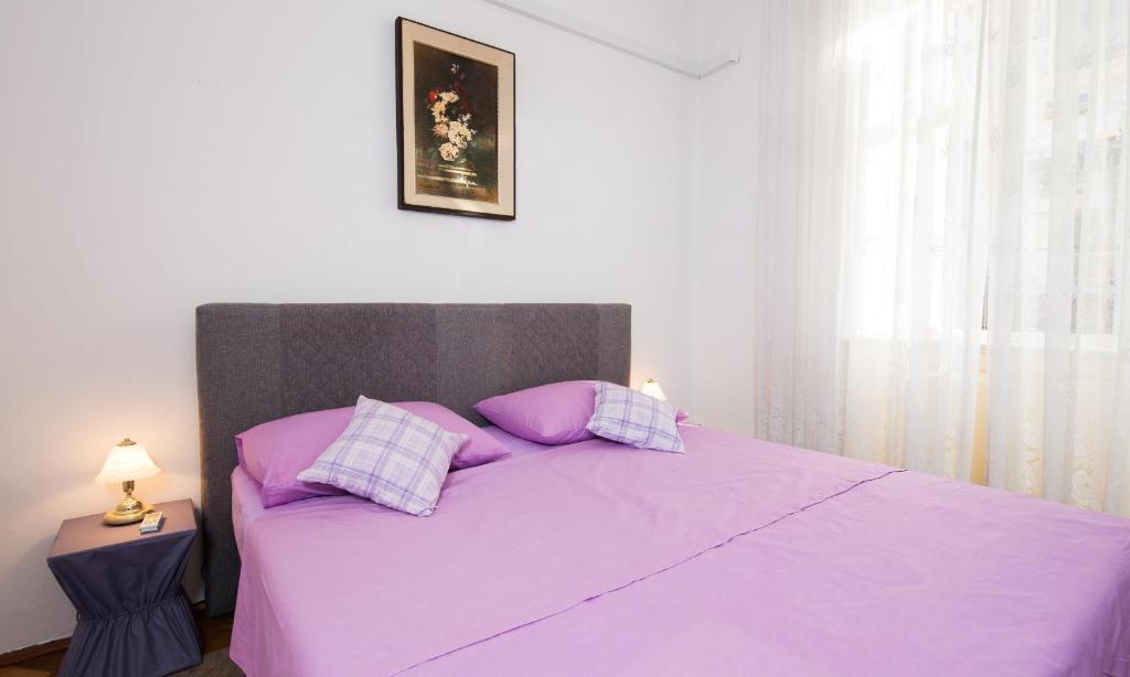 Postel nebo postele na pokoji v ubytování Riva Rooms
