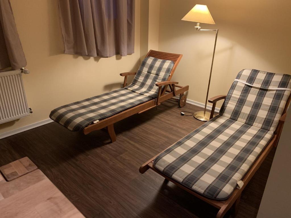 Postel nebo postele na pokoji v ubytování Hotel Bellevue Warnemünde