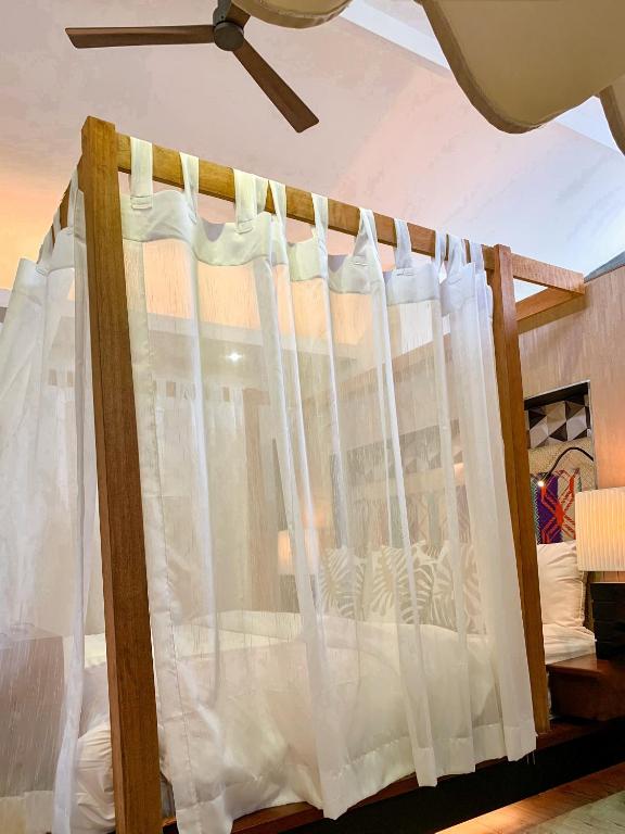 Postel nebo postele na pokoji v ubytování Banig Beach Resort El Nido