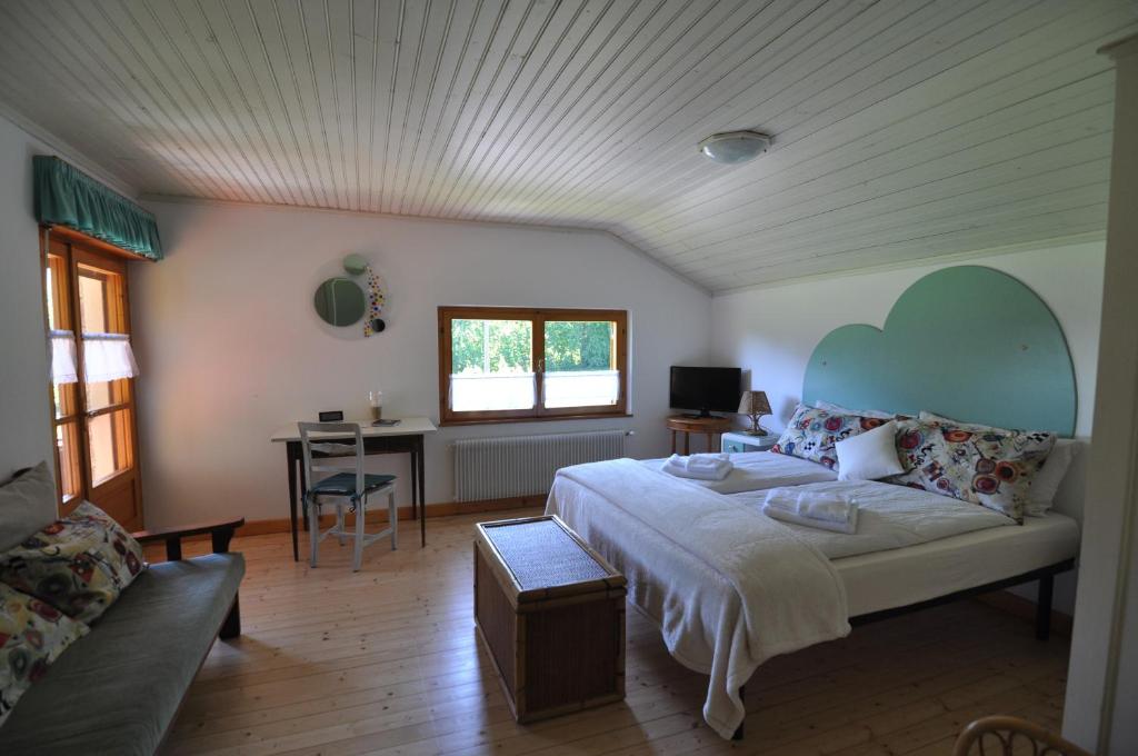 Postel nebo postele na pokoji v ubytování Chalet Barbara in Valle di Sella