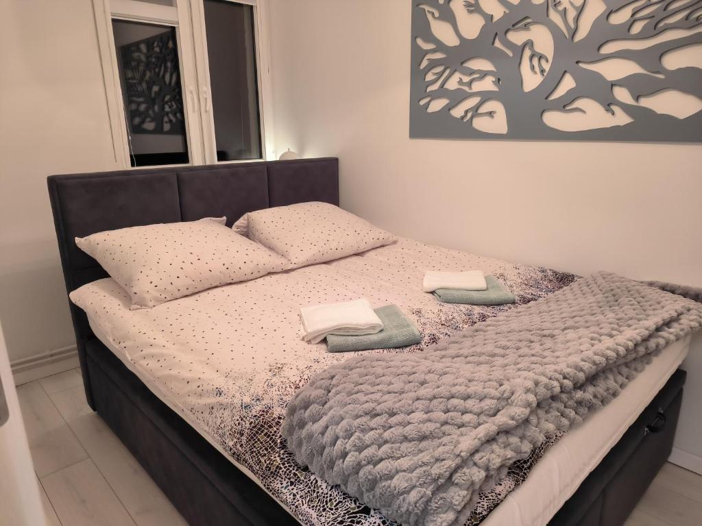 Posteľ alebo postele v izbe v ubytovaní Apartament Stella
