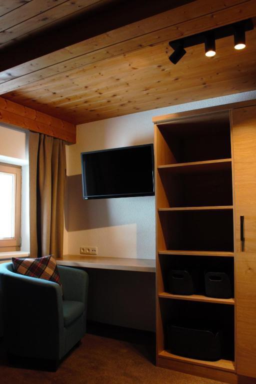 A bed or beds in a room at Haus Biberkopf