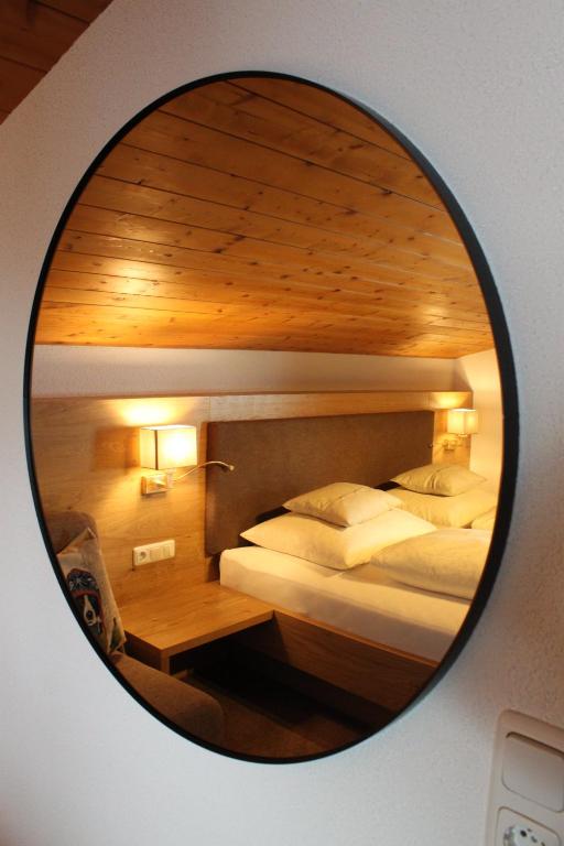 A bed or beds in a room at Haus Biberkopf