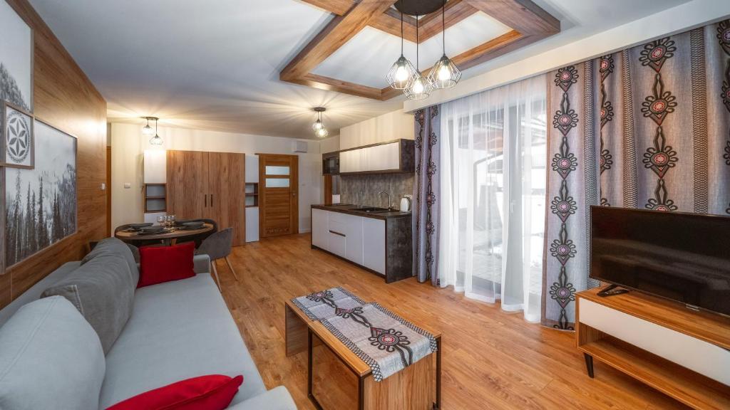 Kuchyňa alebo kuchynka v ubytovaní Apartamenty Sun & Snow Resorts C Białka Tatrzańska z sauną