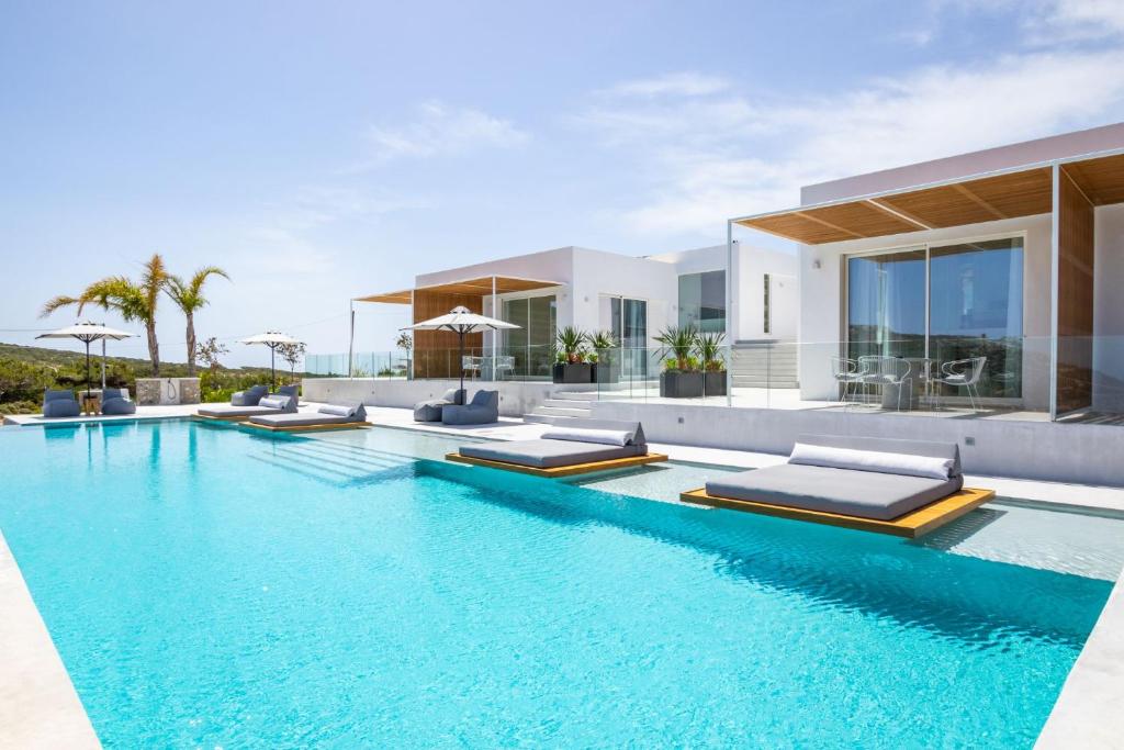 an image of a swimming pool in a house at ISTIA LUXURY VILLAS in Karpathos