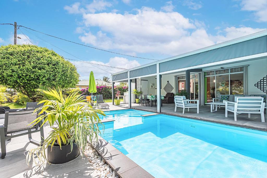 Bazén v ubytování Villa de rêve avec piscine privée à Baie-Mahault nebo v jeho okolí
