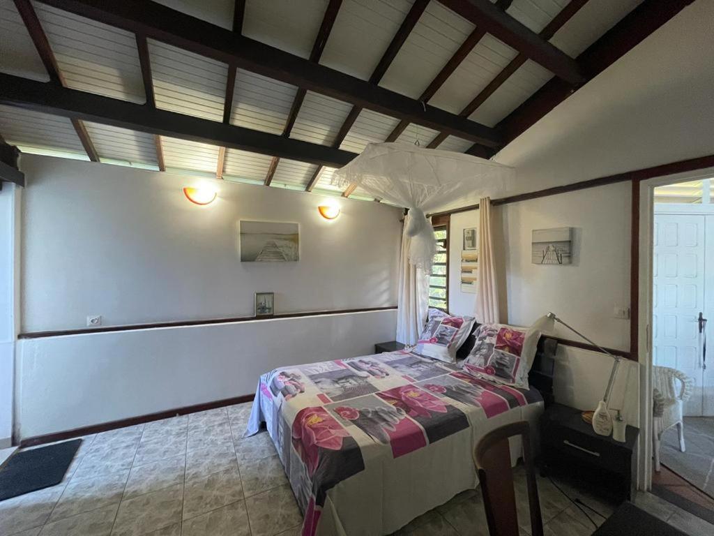 Postel nebo postele na pokoji v ubytování B&B Plage Des Raisiniers