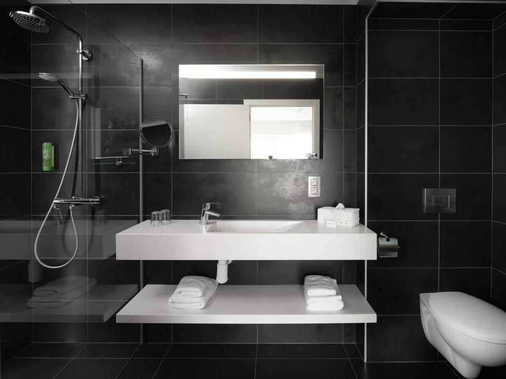 Koupelna v ubytování Le 24 Hotel