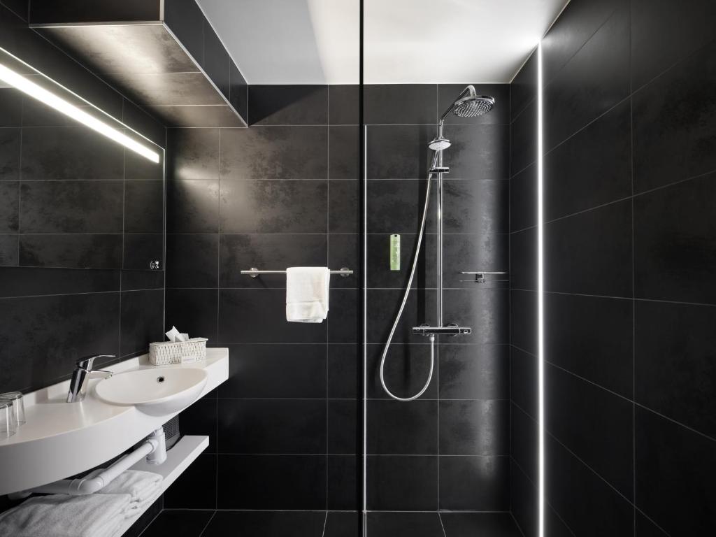 Koupelna v ubytování Le 24 Hotel