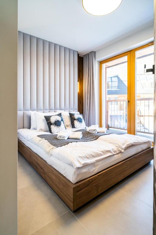 Posteľ alebo postele v izbe v ubytovaní Apartament Owca na wypasie by Apart Concept Podhale