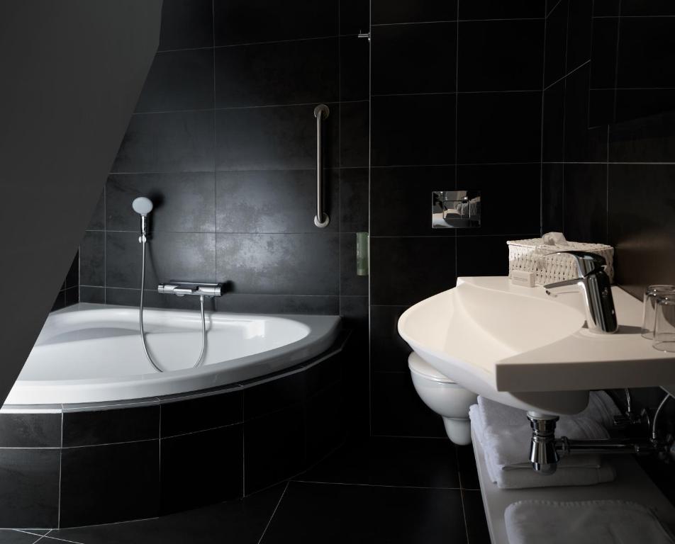 Koupelna v ubytování Le 24 Hotel