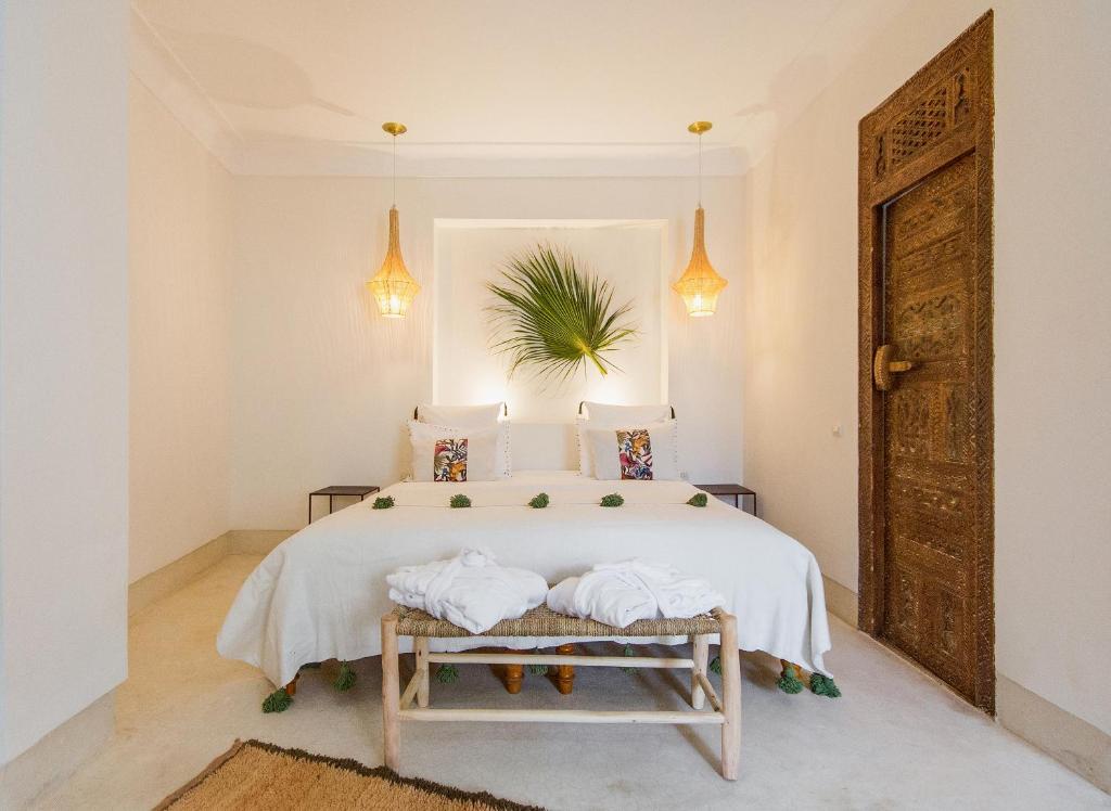Postel nebo postele na pokoji v ubytování RIAD 48 & SPA