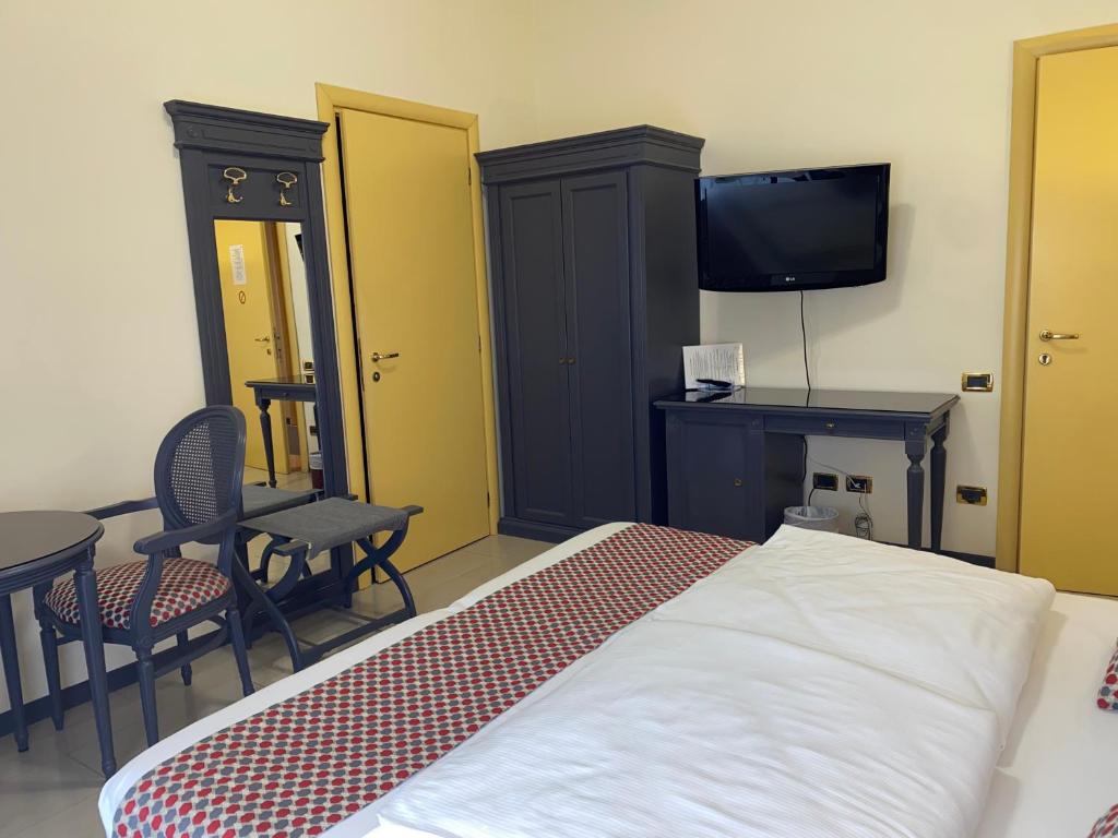 Postel nebo postele na pokoji v ubytování Hotel Estée